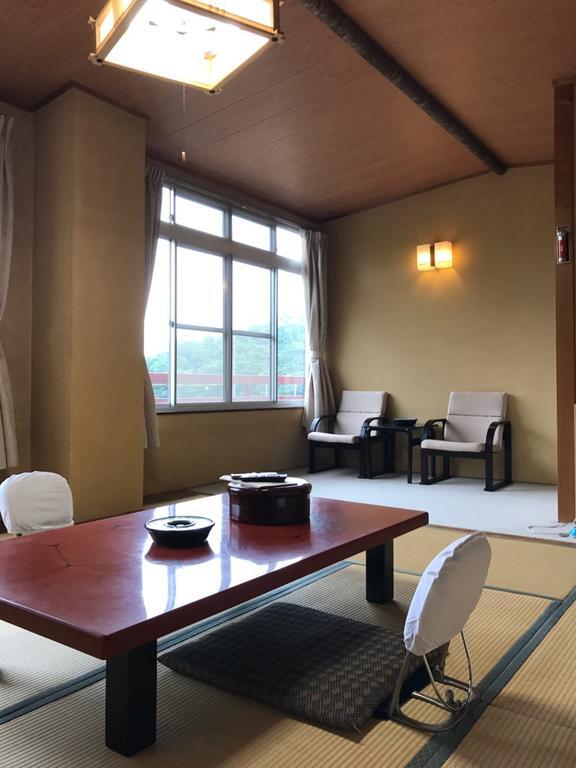 Hotel Tomada Onsen Iyashi No Yado Sensui Okayama Exterior foto