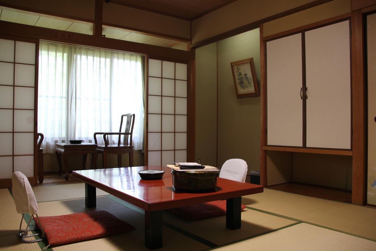 Hotel Tomada Onsen Iyashi No Yado Sensui Okayama Exterior foto